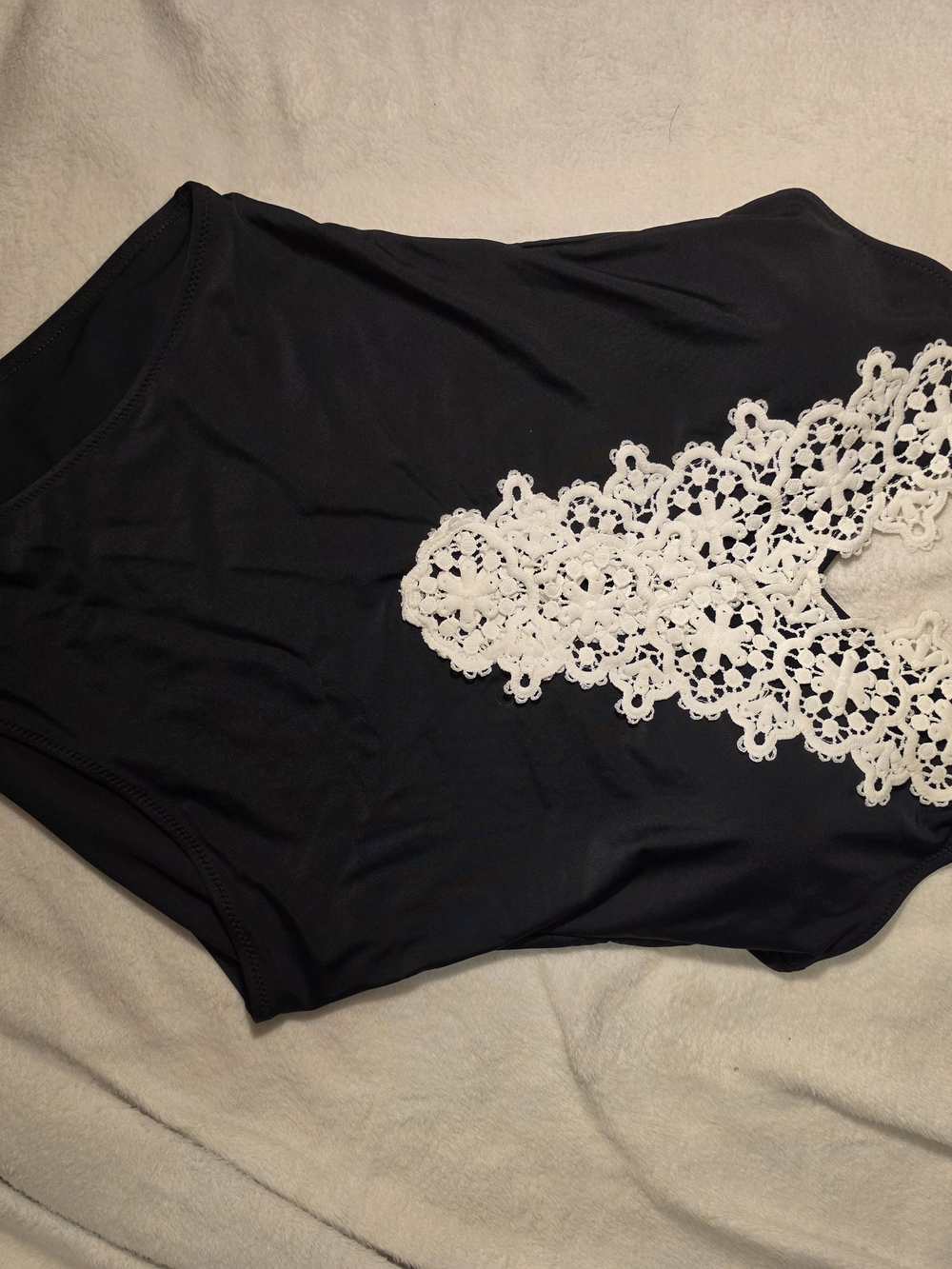 Black One-Piece Swimsuit with White Lace Appliqué